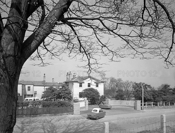 Two Bond disabled cars outside the CISWO paraplegic centre, Pontefract, West Yorkshire, 1960. Artist: Michael Walters