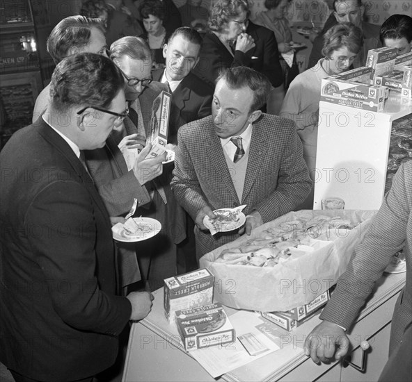 Sampling chicken patties, Wilsic, near Doncaster, South Yorkshire, 1961. Artist: Michael Walters