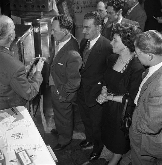 Viewing new barbeque ovens, Wilsic, near Doncaster, South Yorkshire, 1961.  Artist: Michael Walters