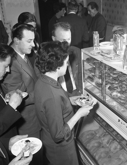 Sampling chicken patties, Wilsic, near Doncaster, South Yorkshire, 1961. Artist: Michael Walters