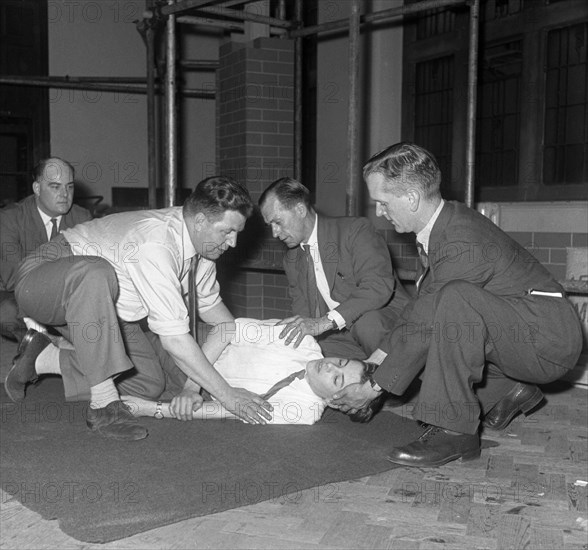 Recovery position, East Midland Gas Board training, 1961.  Artist: Michael Walters