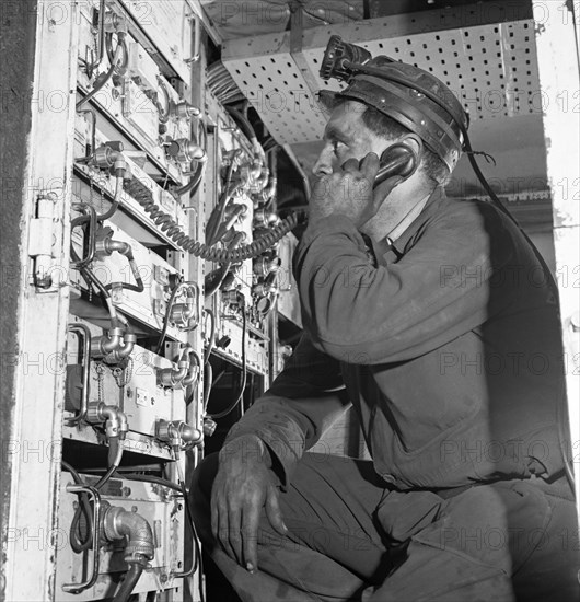 Comunications, a miner from Bevercotes Colliery, Nottinghamshire, 1967.  Artist: Michael Walters