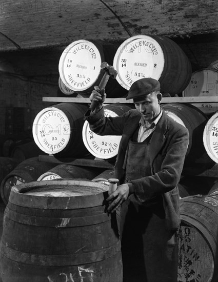 Coopering, making whiskey barrels at Wiley & Co, Sheffield, South Yorkshire, 1961.  Artist: Michael Walters