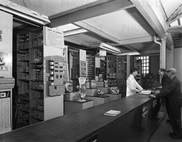 Shop counter, Globe & Simpson auto electrical engineers, Nottingham, Nottinghamshire, 1961. Artist: Michael Walters