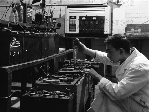 A young apprentice at Globe & Simpson auto electricians workshop, Lincoln, Lincolnshire, 1961. Artist: Michael Walters
