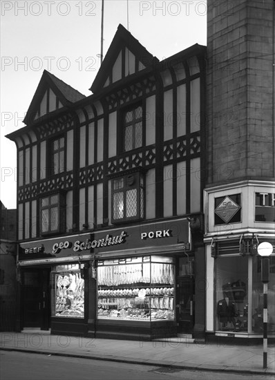 George Schonhut's butchers' shop in Rotherham, South Yorkshire, 1955.  Artist: Michael Walters