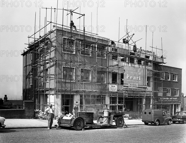 Commercial shop unit construction in Rotherham, South Yorkshire, 1962.  Artist: Michael Walters