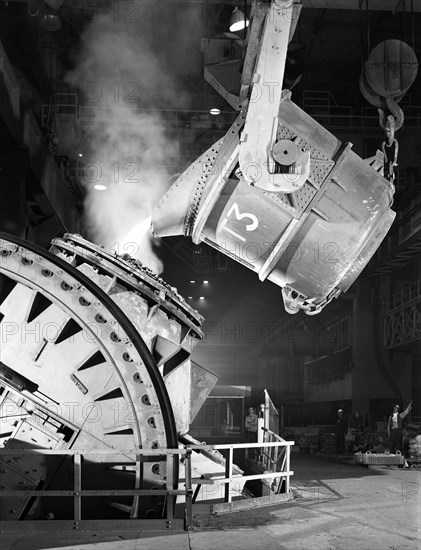 Pouring iron into a Kaldo unit, Park Gate Iron and Steel Co, Rotherham, South Yorkshire, 1964. Artist: Michael Walters
