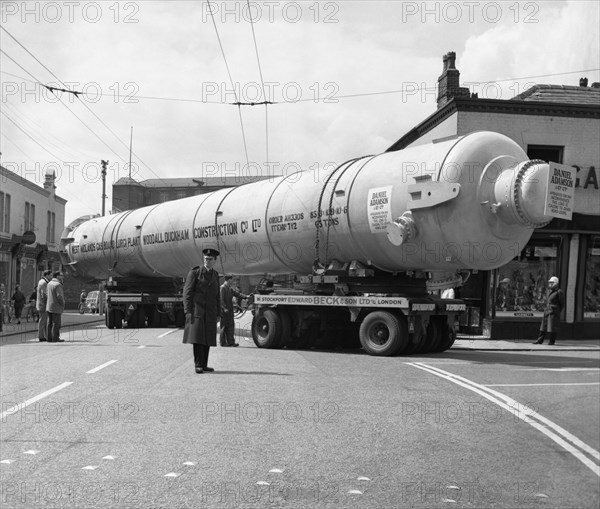 A heavy load stops the Manchester traffic, 1962.  Artist: Michael Walters