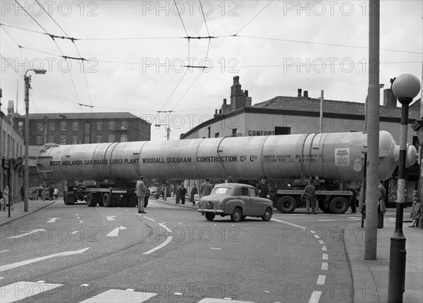 A heavy load stops the Manchester traffic, 1962.  Artist: Michael Walters