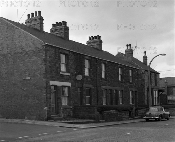 National Provincial Bank located in a terraced house, Goldthope, South Yorkshire, 1963.  Artist: Michael Walters