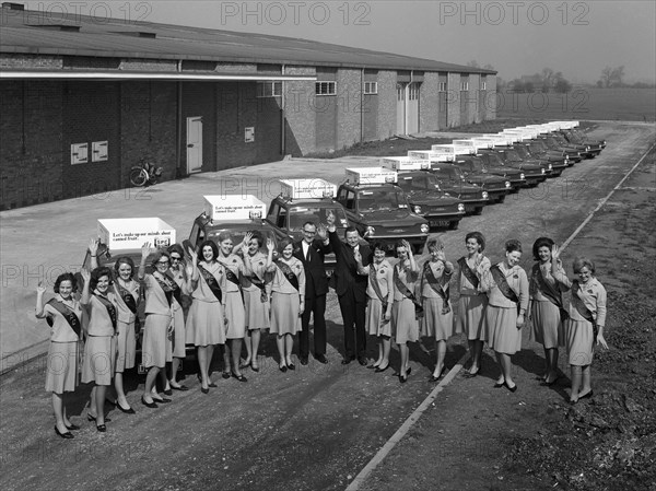 Australian sales girls in front of a fleet of 1965 Hillman Imps, Selby, North Yorkshire, 1965. Artist: Michael Walters