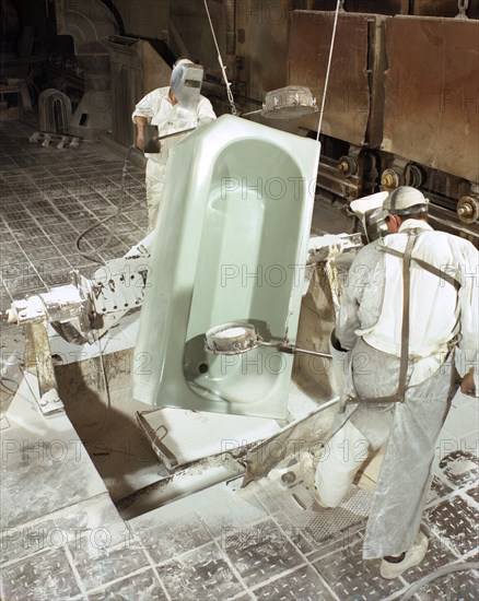 Enamelling a steel bath at Ideal Standard, Hull, Humberside, 1967. Artist: Michael Walters