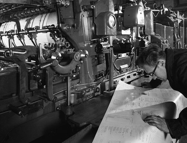 Checking printed pages from a two colour press, Mexborough, South Yorkshire, 1959. Artist: Michael Walters