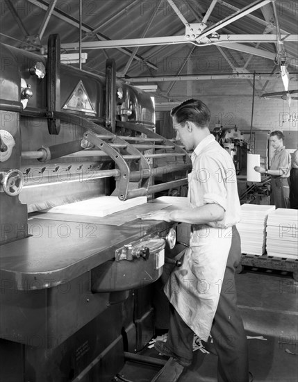Page cutting guillotine in use at a South Yorkshire printing company, 1959. Artist: Michael Walters