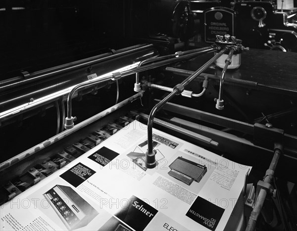 Heidleberg cylinder press in operation at a printworks, Mexborough, South Yorkshire, 1959. Artist: Michael Walters