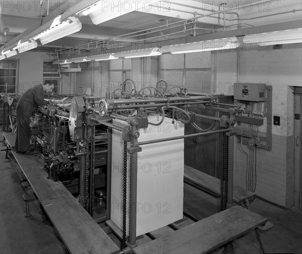 Meilhe two colour printing machine in operation at a printers, Mexborough, South Yorkshire, 1959. Artist: Michael Walters