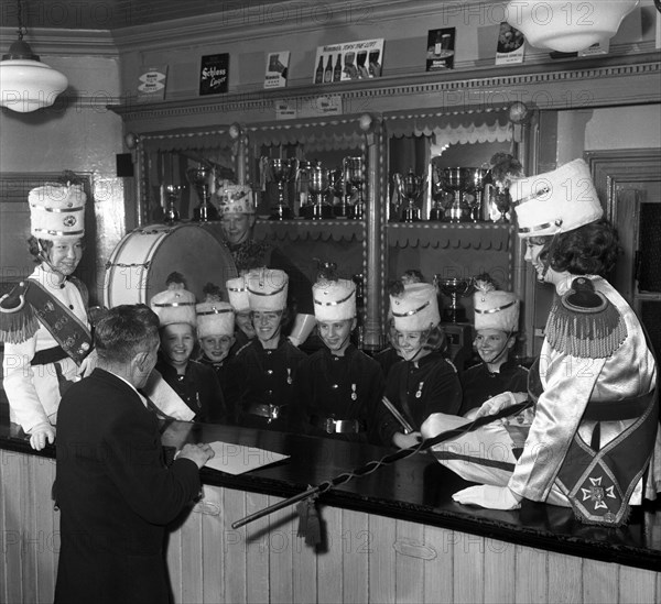 Informal shot of a female marching band, Horden, County Durham, 1963.  Artist: Michael Walters