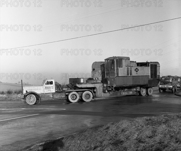 Early 1940s Diamond T truck pulling a large load, South Yorkshire, 1962. Artist: Michael Walters