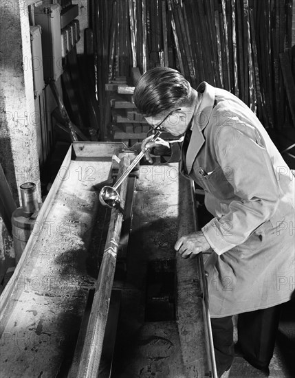 Crack detection on steel bars at J Beardshaw & Sons, Sheffield, South Yorkshire, 1963.  Artist: Michael Walters