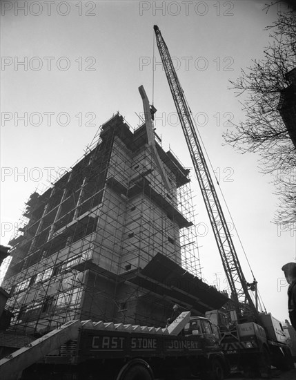 Crane lifting staircase carriageways into a new office building, Sheffield, South Yorkshire, 1961. Artist: Michael Walters