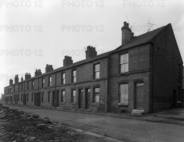 Traditional terraced housing, Albert Road, Kilnhurst, South Yorkshire, 1959. Artist: Michael Walters