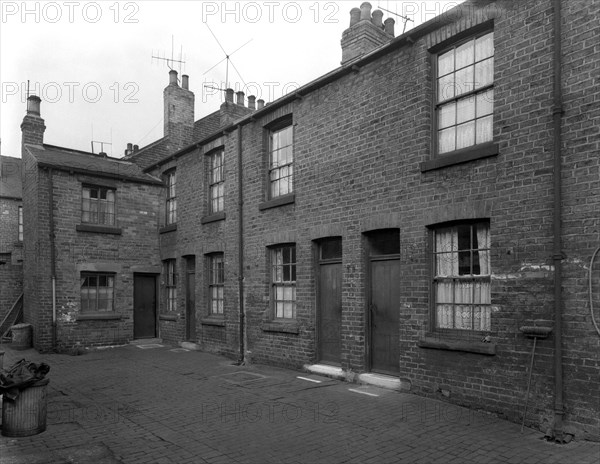 Traditional terraced housing, Albert Road, Kilnhurst, South Yorkshire, 1959. Artist: Michael Walters