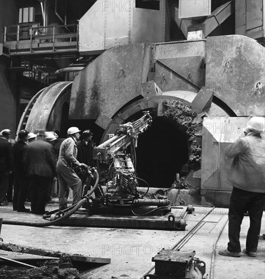 Cleaning a Kaldo furnace, Park Gate Iron & Steel Co, Rotherham, South Yorkshire, 1964. Artist: Michael Walters