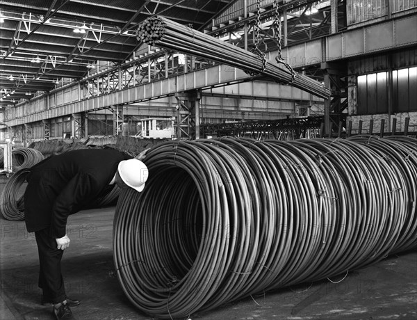 Coils and hexagonal bars at the Park Gate Iron & Steel Co, Rotherham, South Yorkshire, 1964. Artist: Michael Walters