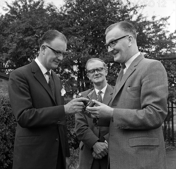 Dr Lowe of ICI being presented with a camera, Denaby Main, South Yorkshire, 1962.  Artist: Michael Walters