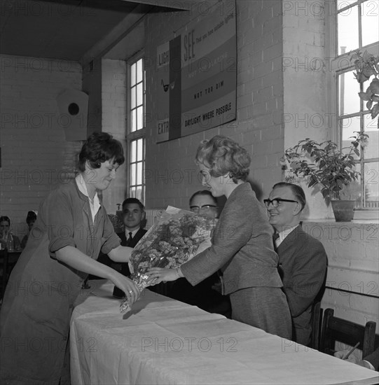 Presentation to a female worker at the ICI Detonator works, Denaby Main, South Yorkshire, 1962.  Artist: Michael Walters