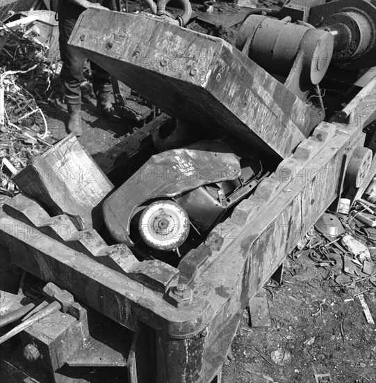 Linderman box baler crushing scrap, Rotherham, South Yorkshire, 1963. Artist: Michael Walters