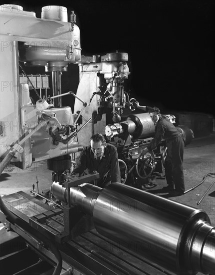 Machining a five foot roller on a lathe at Wombwell Foundry, South Yorkshire, 1963.  Artist: Michael Walters