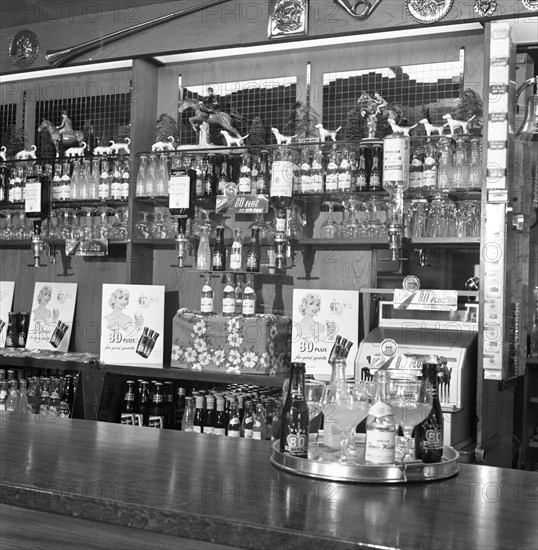 Bar of the Cavalier pub, Ravenfield, near Rotherham, South Yorkshire, 1963. Artist: Michael Walters