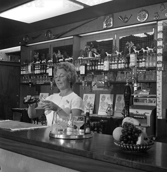 Bar of the Cavalier pub, Ravenfield, near Rotherham, South Yorkshire, 1963. Artist: Michael Walters