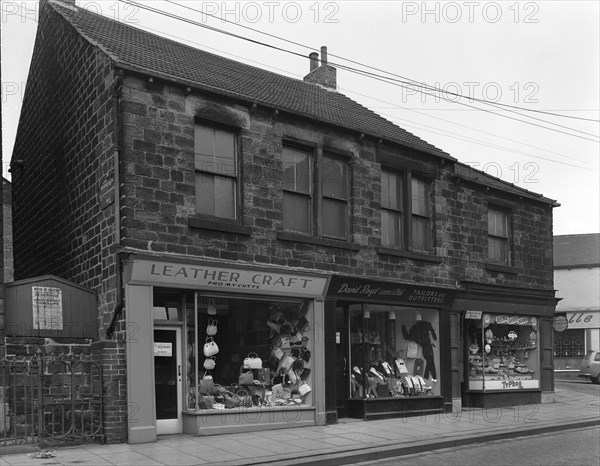 Shops in Bank Street, Mexborough, South Yorkshire, 1963.  Artist: Michael Walters