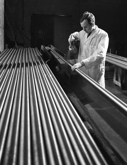 Crack detection on round bars, J Beardshaw & Sons, Sheffield, South Yorkshire, 1963.   Artist: Michael Walters