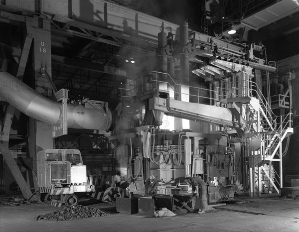 Charging an electric arc furnace, Park Gate Iron & Steel Co, Rotherham, South Yorkshire, 1964. Artist: Michael Walters