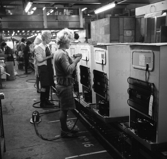 Fridge assembly line at the General Electric Company, Swinton, South Yorkshire, 1964.  Artist: Michael Walters