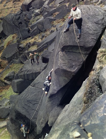 Climbers on Stanage Edge, Hathersage, Derbyshire, 1964.  Artist: Michael Walters