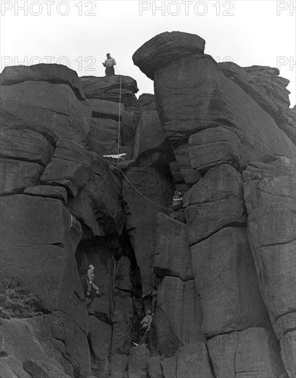 Climbers on Stanage Edge, Hathersage, Derbyshire, 1964.  Artist: Michael Walters