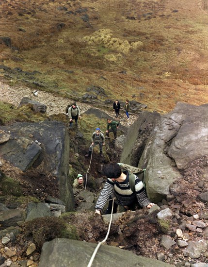 Climbers on Stanage Edge, Hathersage, Derbyshire, 1964.  Artist: Michael Walters