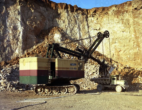 Ruston-Bucyrus 110-RB face shovel loading a Euclid dumper, Steetley quarry, Nottinghamshire, 1967. Artist: Michael Walters