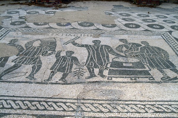 A black and white floor mosaic of grain measurers, Ostia Antica, Italy. Artist: Samuel Magal