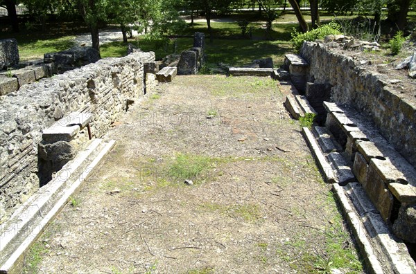 A latrine at Dion, Greece. Artist: Samuel Magal