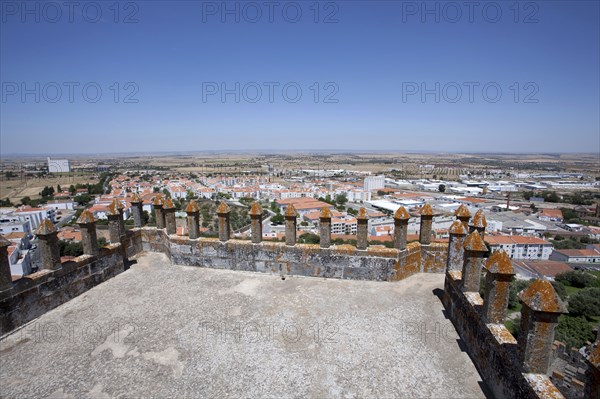 Merlons on the battlements of Beja Castle and view of the city, Beja, Portugal, 2009. Artist: Samuel Magal