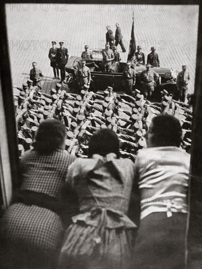 Three girls watching the traditional parade of SA stormtroopers, Nuremberg, Germany, c1923-1938. Artist: Unknown