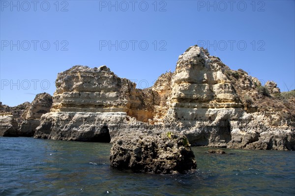 The cliffs at Praia de Dona Ana, Portugal, 2009. Artist: Samuel Magal