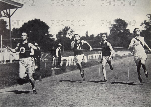 Arthur Duffey, American athlete, running a race, 1902. Artist: Edwin Levick