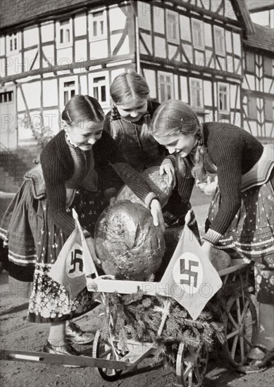 Farm bread being sent to the poor people in the city, Germany, 1936. Artist: Unknown